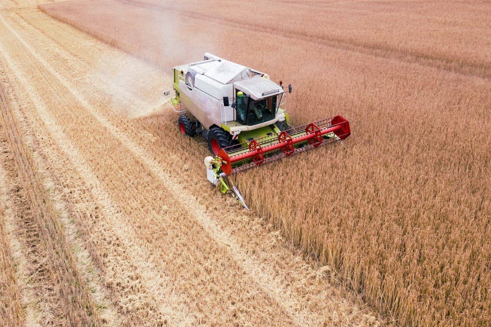 Combine harvester working in a field.